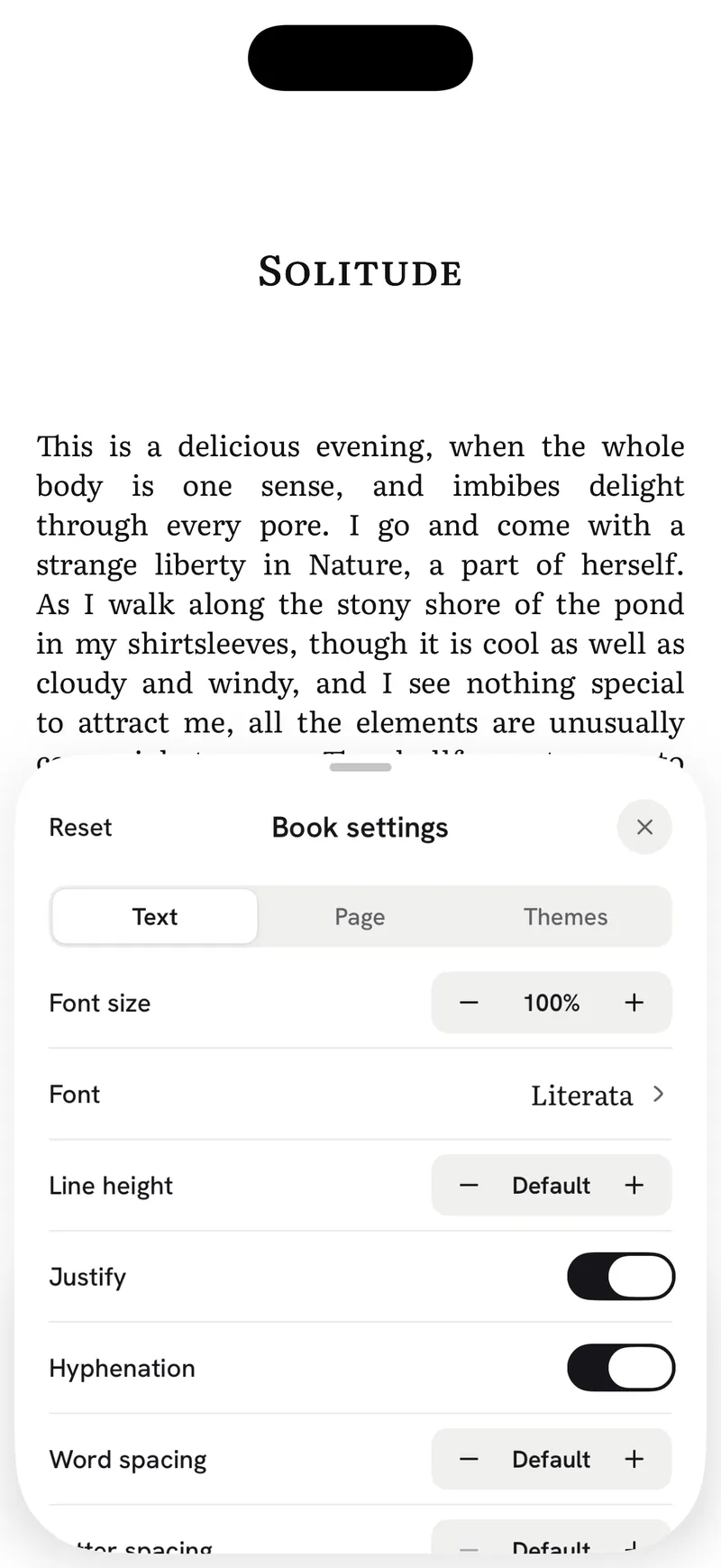 Reader settings open over a book